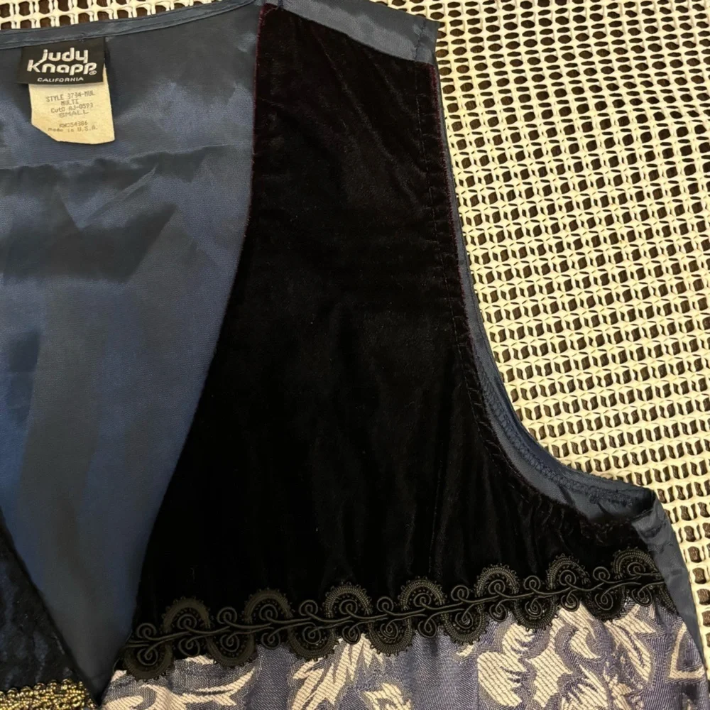 Judy Knapp Vintage vest in various shades of blue by with a printed design SizeS